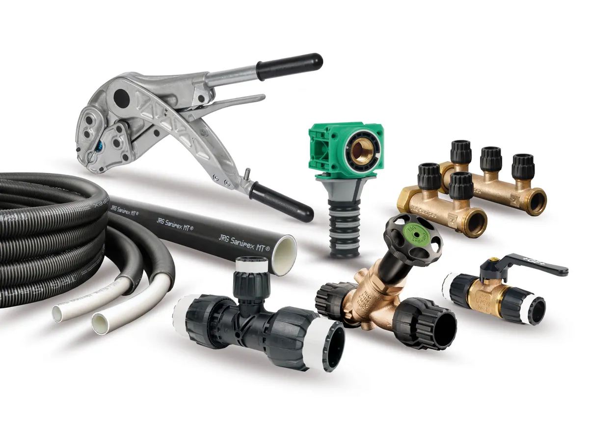 JRG Sanipex MT: schwarze Rohre und Fittings, Verteiler, Armaturen und ein manuelles Montagewerkzeug